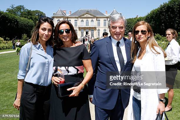 Sidney Toledano , his wife Katia Toledano , his daughter Julia Toledano and Miss Manuel valls, Violonist Anne Gravoin attend the Christian Dior show...