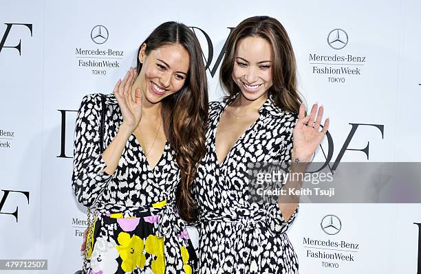 Models Jessica Michibata and Angelica Michibata attend the DIANE von FURSTENBERG show as part of Mercedes Benz Fashion Week TOKYO 2014 A/W at Shibuya...