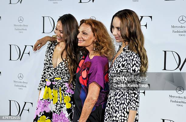 Model Jessica Michibata, designer Diane Von Furstenburg and model Angelica Michibata attend the DIANE von FURSTENBERG show as part of Mercedes Benz...