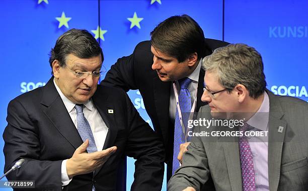 European Commission president Jose Manuel Barroso chats with Business Europe director-general Markus Beyrer and Laszlo Andor , EU commissioner for...