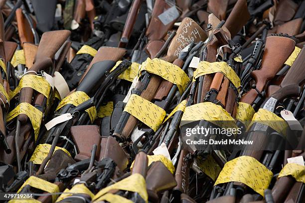 Guns fill the bed of a dump truck during the destruction of approximately 3,400 guns and other weapons at the Los Angeles County Sheriffs' 22nd...