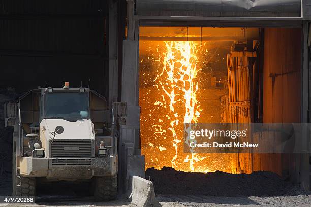 Slag is discarded during the destruction of approximately 3,400 guns and other weapons at the Los Angeles County SheriffsÕ 22nd annual gun melt at...