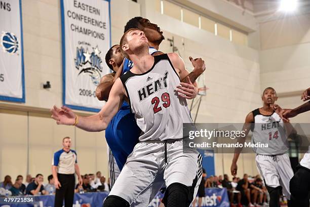 Seth Tuttle of the Miami Heat boxes out against the Detroit Pistons during the 2015 Orlando Pro Summer League game on July 6, 2015 at Amway Center in...