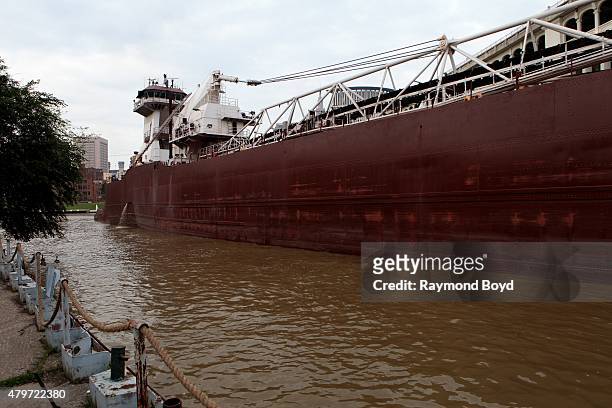 The Dorothy Ann Interlake Steamship makes its way up the Cuyahoga River as photographed from the Superior Viaduct on June 19, 2015 in Cleveland, Ohio.