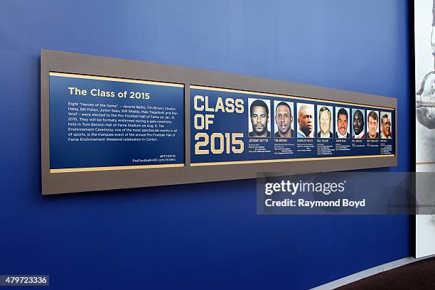 Photos of Hall of Fame Class of 2015 are displayed in the lobby of the Pro Football Hall of Fame on June 20, 2015 in Canton, Ohio.