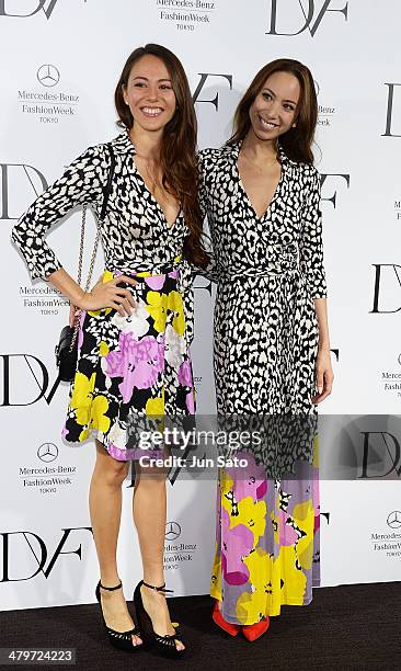 Models Jessica Michibata and Angelica Michibata attend the DIANE von FURSTENBERG show as part of Mercedes Benz Fashion Week TOKYO 2014 A/W at Shibuya...