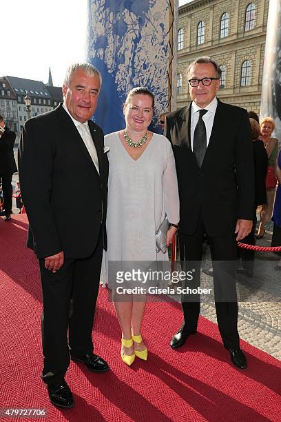 Minister Ludwig Spaenle and his wife Miriam, Klaus Bachler during the premiere of the opera 'Arabella' on July 6, 2015 in Munich, Germany.