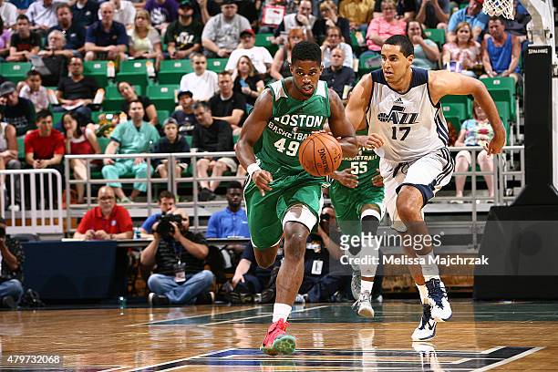 Fair of the Boston Celtics brings the ball up court against Grant Jerrett of the Utah Jazz during the NBA Summer League on July 6, 2015 at...