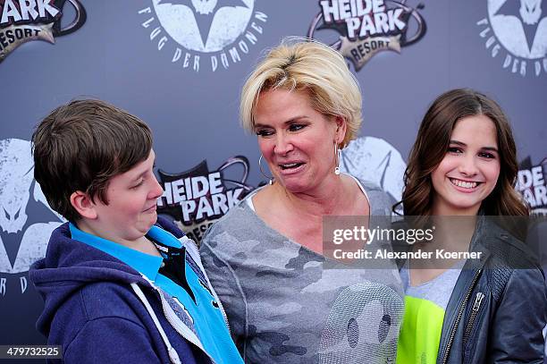 Designer Claudia Effenberg, together with her children Lucia Effenberg and Thomas Strunz, attends the opening of the new wing coaster 'Flug der...