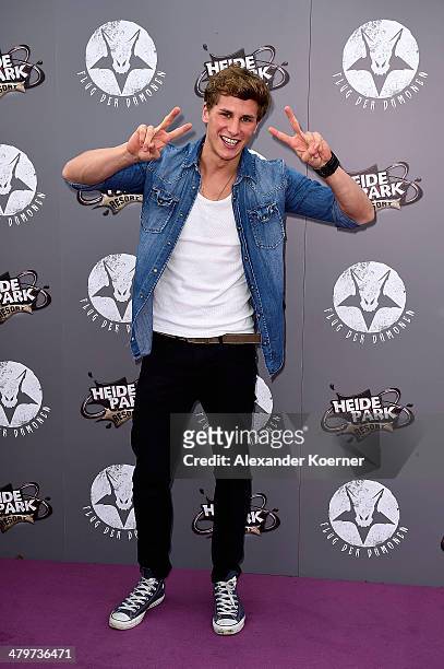 Model and actor Lukas Sauer attends the opening of the new wing coaster 'Flug der Daemonen' at Heidepark on March 20, 2014 in Soltau, Germany.