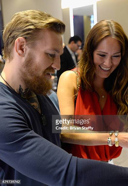 Host/VIP Conor McGregor and Dee Devlin attend the David Yurman with Conor McGregor Hosts an In-Store Event on July 6, 2015 in Las Vegas, Nevada.