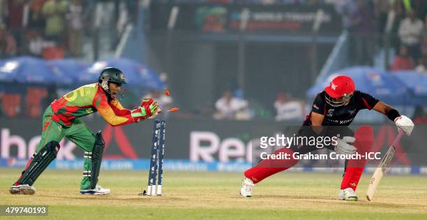 Mushfiqur Rahim of Bangladesh stumps Munir Dar of Hong Kong during the Bangladesh v Hong Kong match at the ICC World Twenty20 Bangladesh 2014 played...