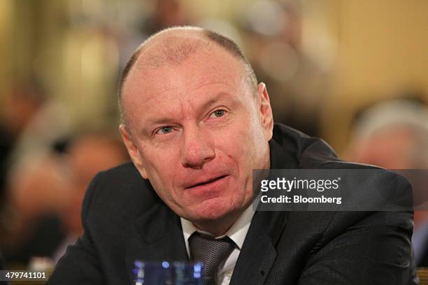 Vladimir Potanin, billionaire and owner of OAO GMK Norilsk Nickel, pauses while sitting with other Russian billionaires at a meeting of the Russian...