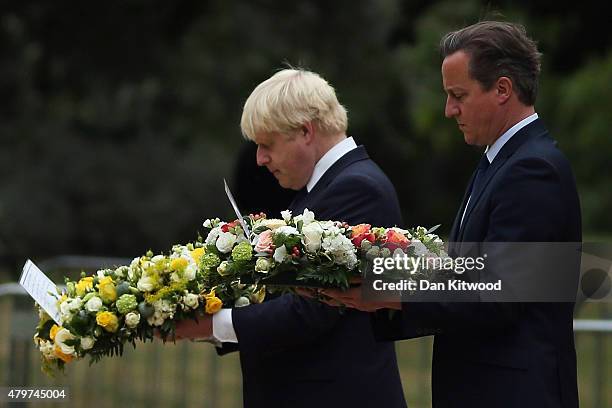British Prime Minister David Cameron and London Mayor Boris Johnson during a ceremony at the memorial to the victims of the July 7, 2005 London...