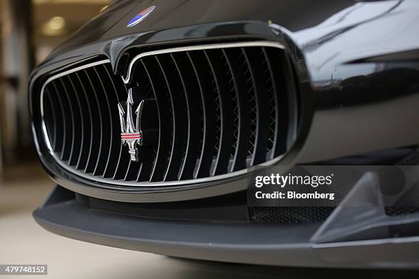 Maserati logo sits on the front grill of a luxury automobile in the Maserati luxury automobile dealership in Almaty, Kazakhstan, on Thursday, June...