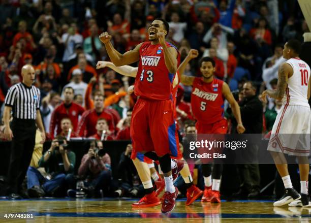 Vee Sanford of the Dayton Flyers reacts after defeating the Ohio State Buckeyes 60-59 in the second round of the 2014 NCAA Men's Basketball...