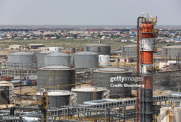 Oil and fuel storage tanks stand at the Atyrau oil refinery, operated by KazMunaiGas National Co., in Atyrau, Kazakhstan, on Thursday, July 2, 2015....