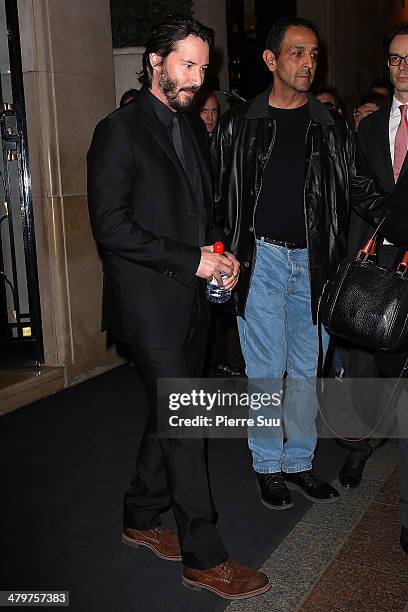 Keanu reeves leaves his hotel on March 20, 2014 in Paris, France.