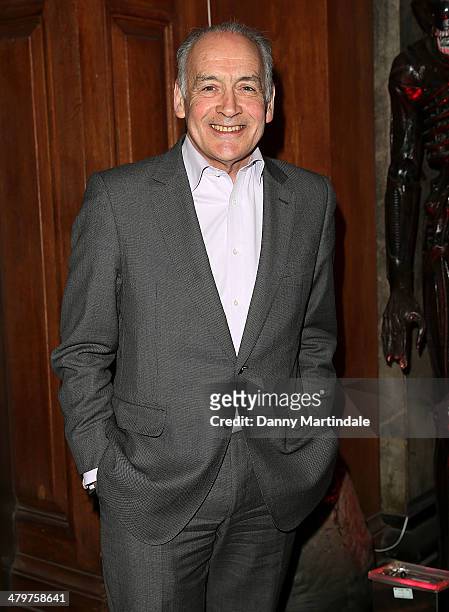 Alastair Stewart attends the annual Ultimate News Quiz for Action for Children and Restless Development at the London Film Museum on March 20, 2014...