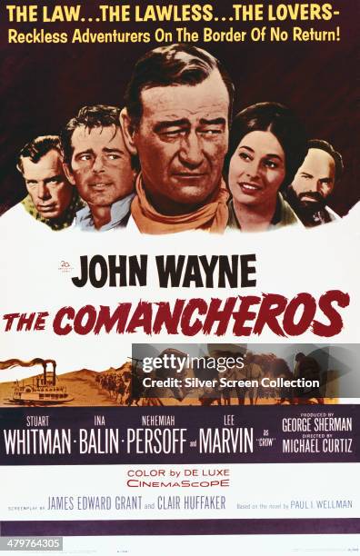 Poster for the 1961 western 'The Comancheros', directed by Michael Curtiz, 1961. The film stars Lee Marvin, Stuart Whitman, John Wayne, Ina Balin and...