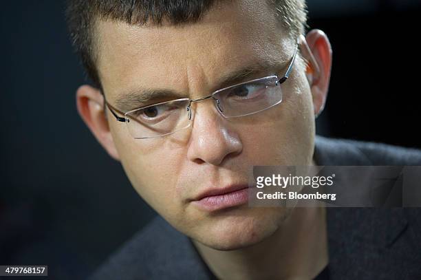 Max Levchin, co-founder of PayPal Inc. And chairman of Kaggle Inc., listens during a Bloomberg West Television interview in San Francisco,...