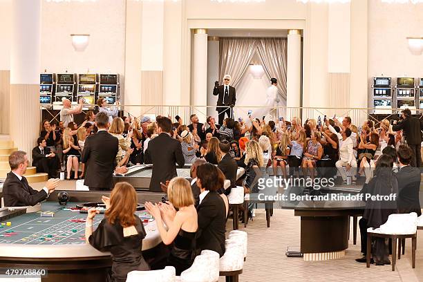 Karl Lagerfeld acknowledges the applause of the audience at the end of the Chanel show as part of Paris Fashion Week Haute Couture Fall/Winter...