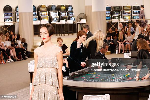 Actress Julianne Moore, Model Lara Stone and Actress Isabelle Huppert attend the Chanel show as part of Paris Fashion Week Haute Couture Fall/Winter...