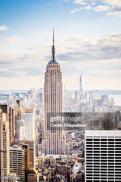 edificios de la ciudad de nueva york-midtown y el edificio empire state. - empire state building fotografías e imágenes de stock