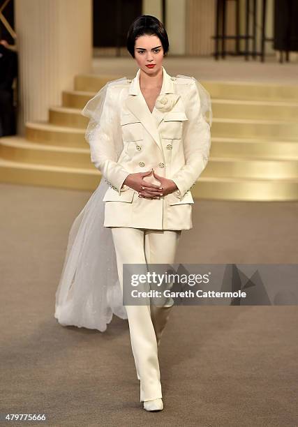 Kendall Jenner walks the runway during the Chanel show as part of Paris Fashion Week Haute Couture Fall/Winter 2015/2016 at the Grand Palais on July...