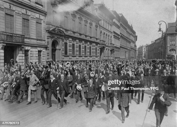 An exuberant crowd gathers outside the Austrian embassy in Berlin, upon news of the outbreak of war with Serbia, which led to World War I, 25th July...