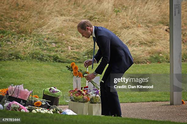 Prince William, Duke of Cambridge lays a wreath during a ceremony at the memorial to the victims of the July 7, 2005 London bombings, in Hyde Park on...