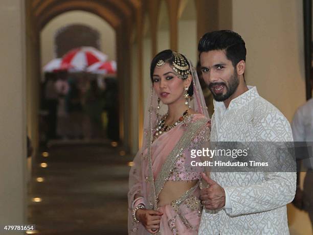 Bollywood actor Shahid Kapoor with his wife Mira Rajput poses for his first photo op post wedding on July 7 at Hotel Trident on July 7, 2015 in...