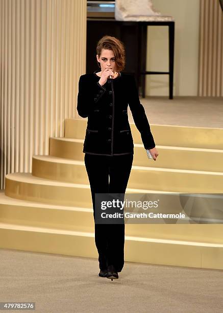 Kristen Stewart walks the runway during the Chanel show as part of Paris Fashion Week Haute Couture Fall/Winter 2015/2016 at the Grand Palais on July...