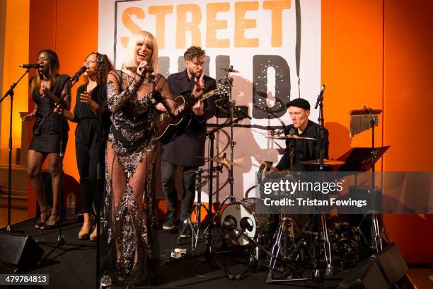 Sarah Harding on stage at the Street Child 5th anniversary party at Kensington Palace on March 20, 2014 in London, England.