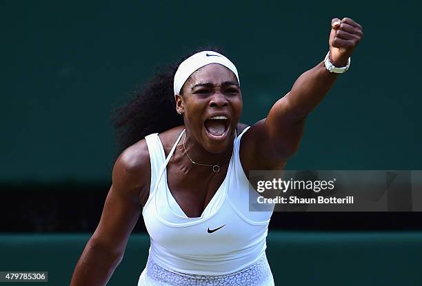 Serena Williams of the United States celebrates winning a point in her Ladies Singles Quarter Final match against Victoria Azarenka of Belarus during...