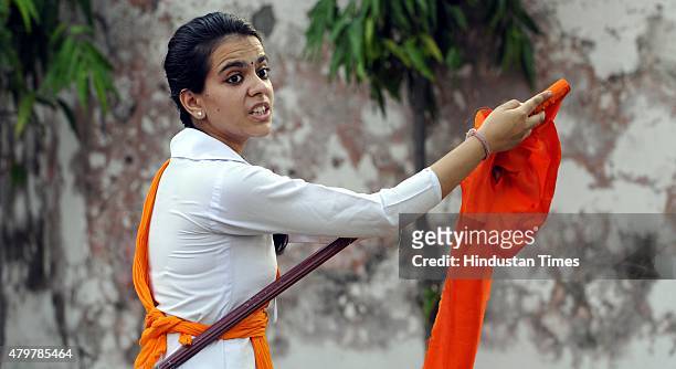 Member of Durga Vahini practices martial arts during week-long self defense training camp on July 7, 2015 in Jammu, India. The Durga Vahini is the...