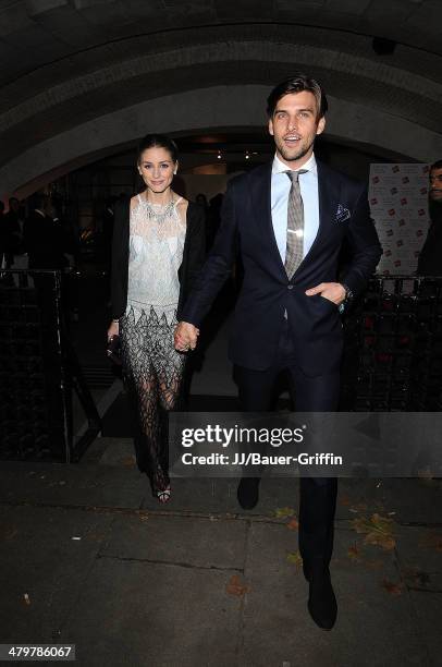 Olivia Palermo and her boyfriend Johannes Huebl are seen arriving at Summerset House for the Valentino: Master of Couture Private View on November...
