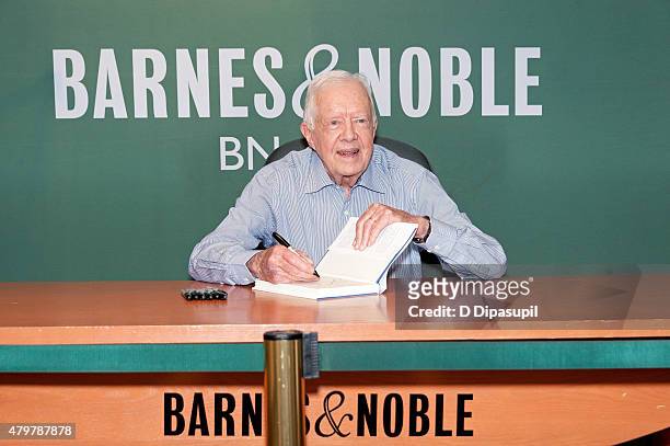 Former U.S. President Jimmy Carter signs copies of his book "Full Life: Reflections at Ninety" at Barnes & Noble, 5th Avenue on July 7, 2015 in New...