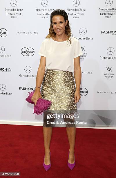 Alexandra Neldel attends the Marc Cain show during the Mercedes-Benz Fashion Week Berlin Spring/Summer 2016 at Brandenburg Gate on July 7, 2015 in...