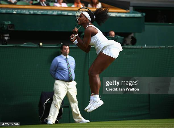 Serena Williams of the United States celebrates winning at match point in her Ladies Singles Quarter Final match against Victoria Azarenka of Belarus...