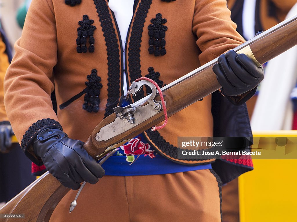 Musket in position of shot held by a Musketeer