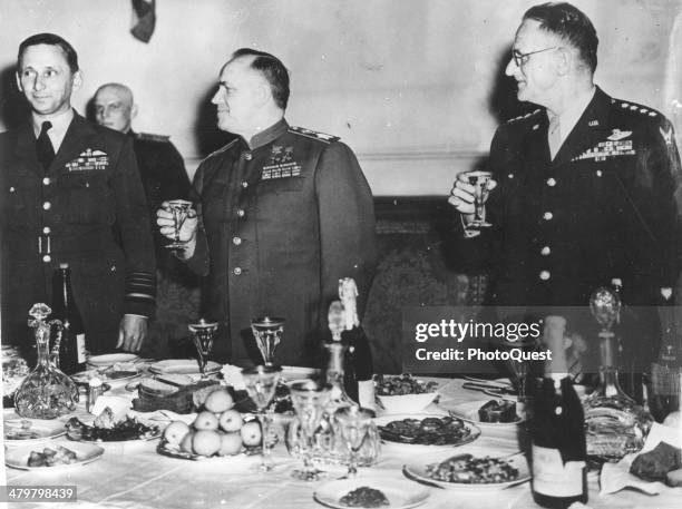 Pictured are, from left, Air Chief Marshal Sir Arthur Tedder, Deputy Supreme Commander Field Marshal Georgy K Zhukov, Deputy Commander in Chief of...