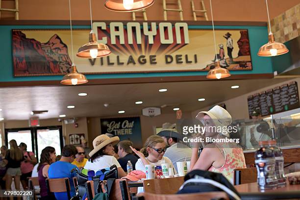 Visitor sits at a dining table in the Canyon Village Deli at Grand Canyon National Park in Grand Canyon, Arizona, U.S., on Thursday, June 25, 2015....