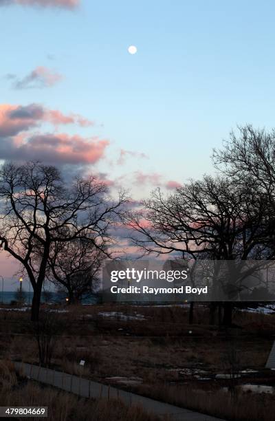 Sunset view over Lake Michigan, as photographed from the Lincoln Park Zoo bridge in Chicago, Illinois on MARCH 14, 2014.