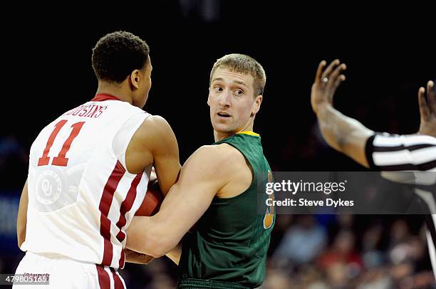 Mike Felt of the North Dakota State Bison looks back at the referee while playing against Isaiah Cousins of the Oklahoma Sooners during the second...