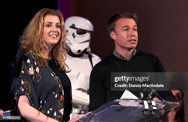 Penny Mordaunt MP and Graeme Le Saux attend the annual Ultimate News Quiz at the London Film Museum on March 20, 2014 in London, England.