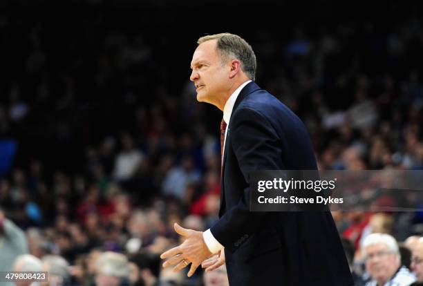 Head coach Lon Kruger of the Oklahoma Sooners yells to his team during the second round of the 2014 NCAA Men's Basketball Tournament against the...