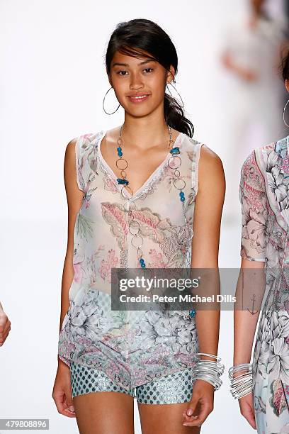 Model Anuthida Ploypetch walks the runway at the Riani show during the Mercedes-Benz Fashion Week Berlin Spring/Summer 2016 at Brandenburg Gate on...