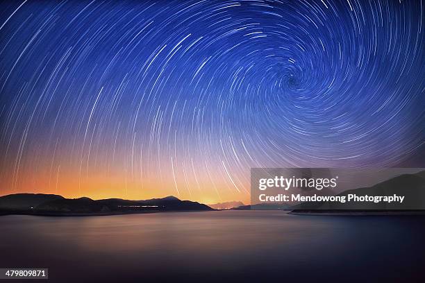 vortex - star trail stock pictures, royalty-free photos & images