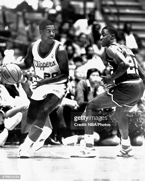 Quintin Dailey of the Los Angeles Clippers dribbles at the LA Sports Coliseum circa 1989 in Los Angeles, California. NOTE TO USER: User expressly...
